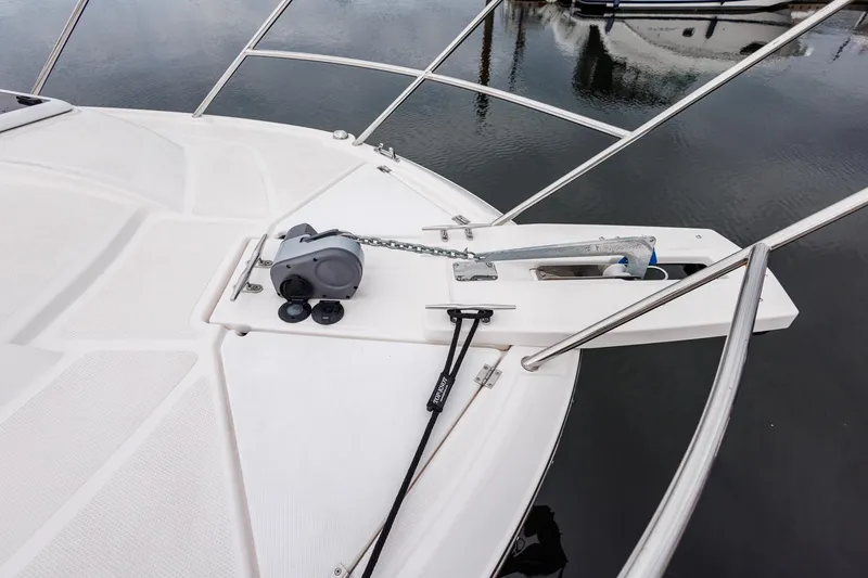 Slide: The Image of Solara S-250 Coupe 2025 boat deck with anchor and railing. - 17