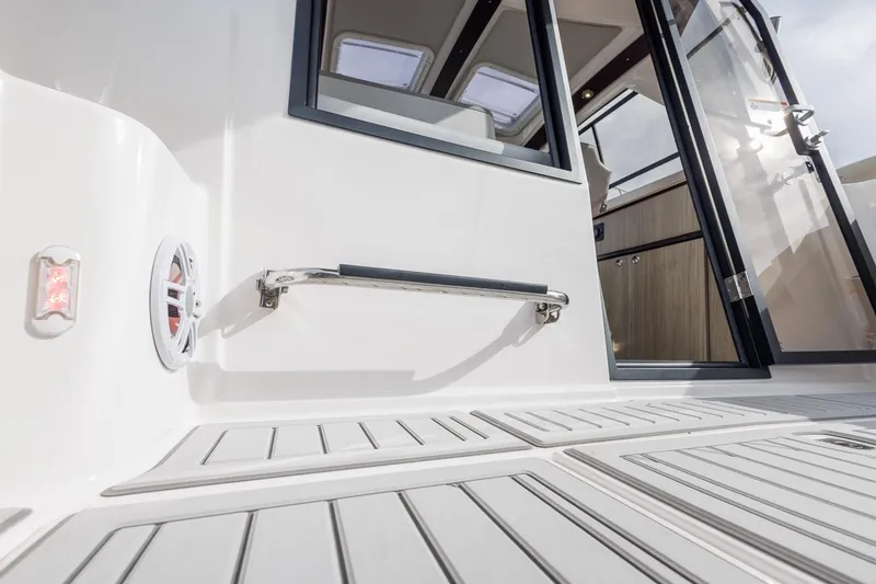 Slide: The Image of 2025 Solara S-250 Coupe boat deck with sleek design and modern features. - 12