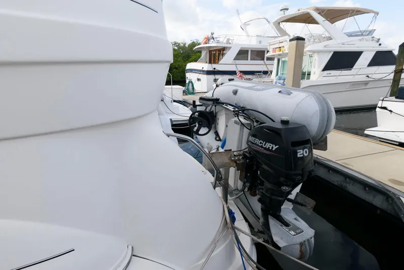 Slide: The Image of 2006 Sea Ray 40 Motor Yacht with Mercury outboard motor at marina. - 10
