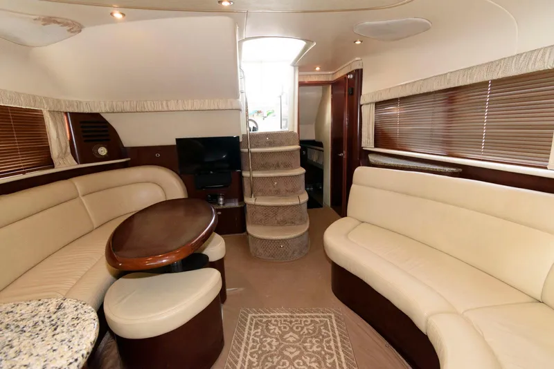 Slide: The Image of Luxurious interior of 2006 Sea Ray 40 Motor Yacht with elegant seating and modern amenities. - 14