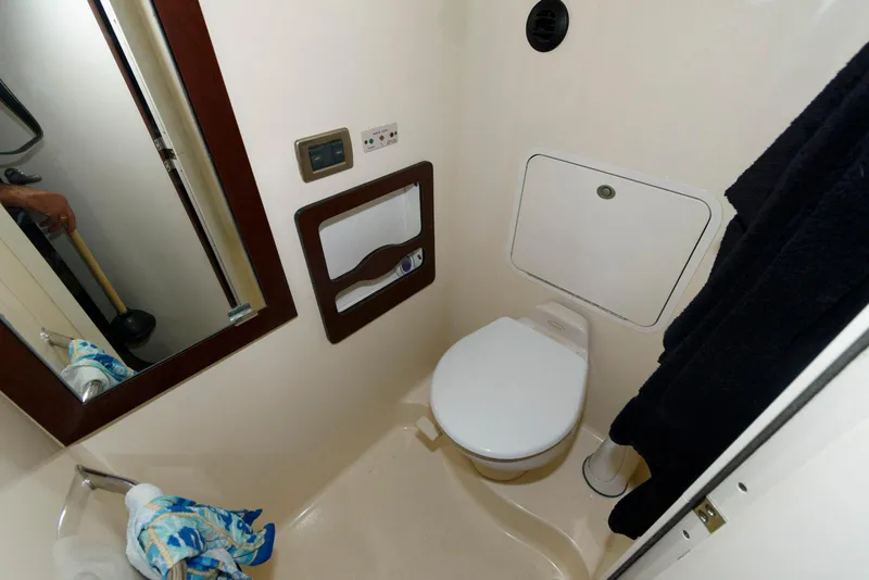 Slide: The Image of 2006 Sea Ray 40 Motor Yacht bathroom with toilet and mirror. - 19