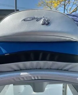 Slide: The Image of 2006 Baja 35 Outlaw boat seat with logo, blue and black accents. - 14