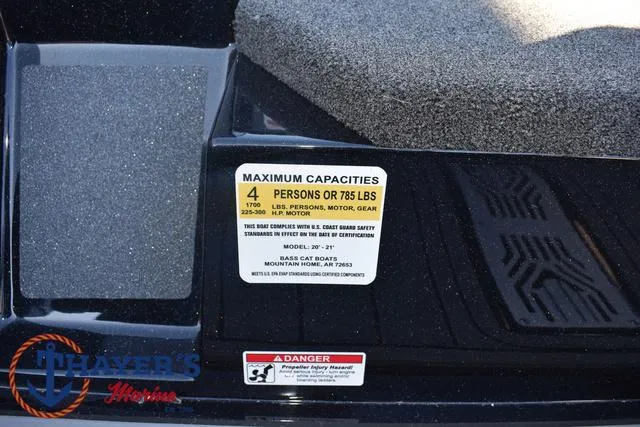 Slide: The Image of 2025 Bass Cat Puma STS capacity label, maximum 4 persons or 785 lbs. - 29