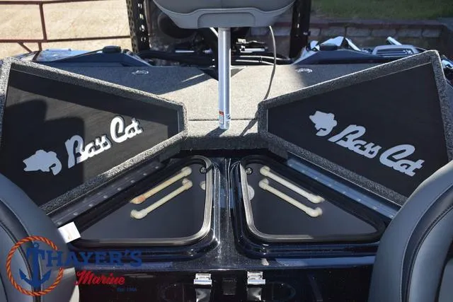 Slide: The Image of 2025 Bass Cat Puma STS boat interior with storage compartments open. - 33