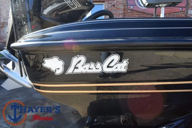 Slide: The Image of 2025 Bass Cat Puma STS boat with logo, displayed at Thayer's Marine. - 4