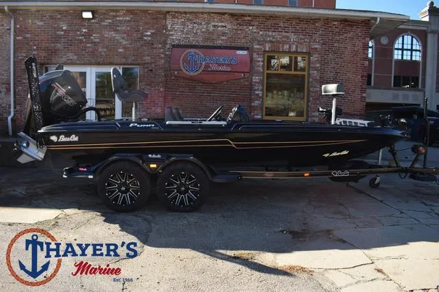 Slide: The Image of 2025 Bass Cat Puma STS boat at Thayer's Marine dealership. - 47