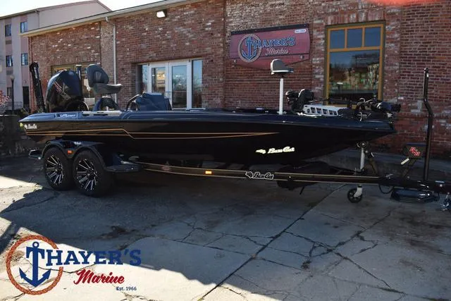 Slide: The Image of 2025 Bass Cat Puma STS boat at Thayer's Marine dealership. - 48
