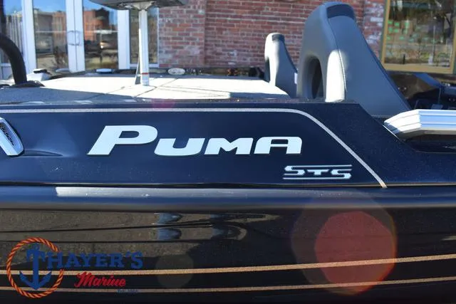 Slide: The Image of 2025 Bass Cat Puma STS boat with logo, displayed at Thayer's Marine. - 5