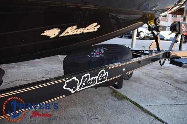Slide: The Image of 2025 Bass Cat Puma STS boat trailer with logo, displayed at Thayer's Marine. - 7