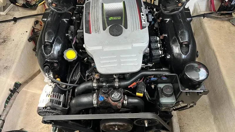 Slide: The Image of 2011 Bayliner 285 Cruiser engine, detailed view of components and layout. - 23