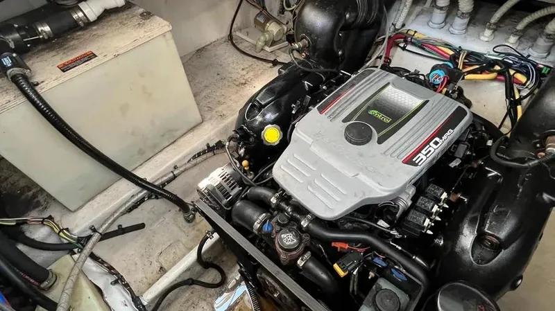Slide: The Image of Engine compartment of a 2011 Bayliner 285 Cruiser with a 350 MAG engine. - 25