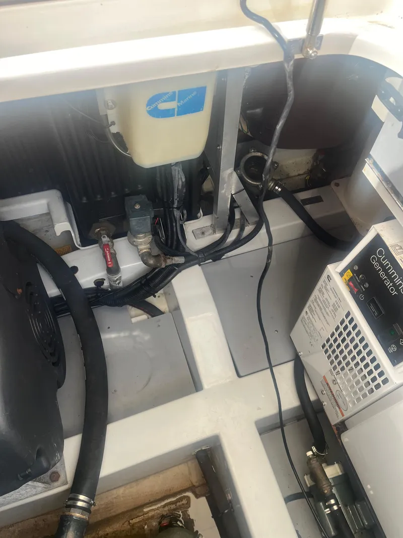 Slide: The Image of Engine compartment of 2013 Azimut 40 Flybridge yacht, showing wiring and components. - 12