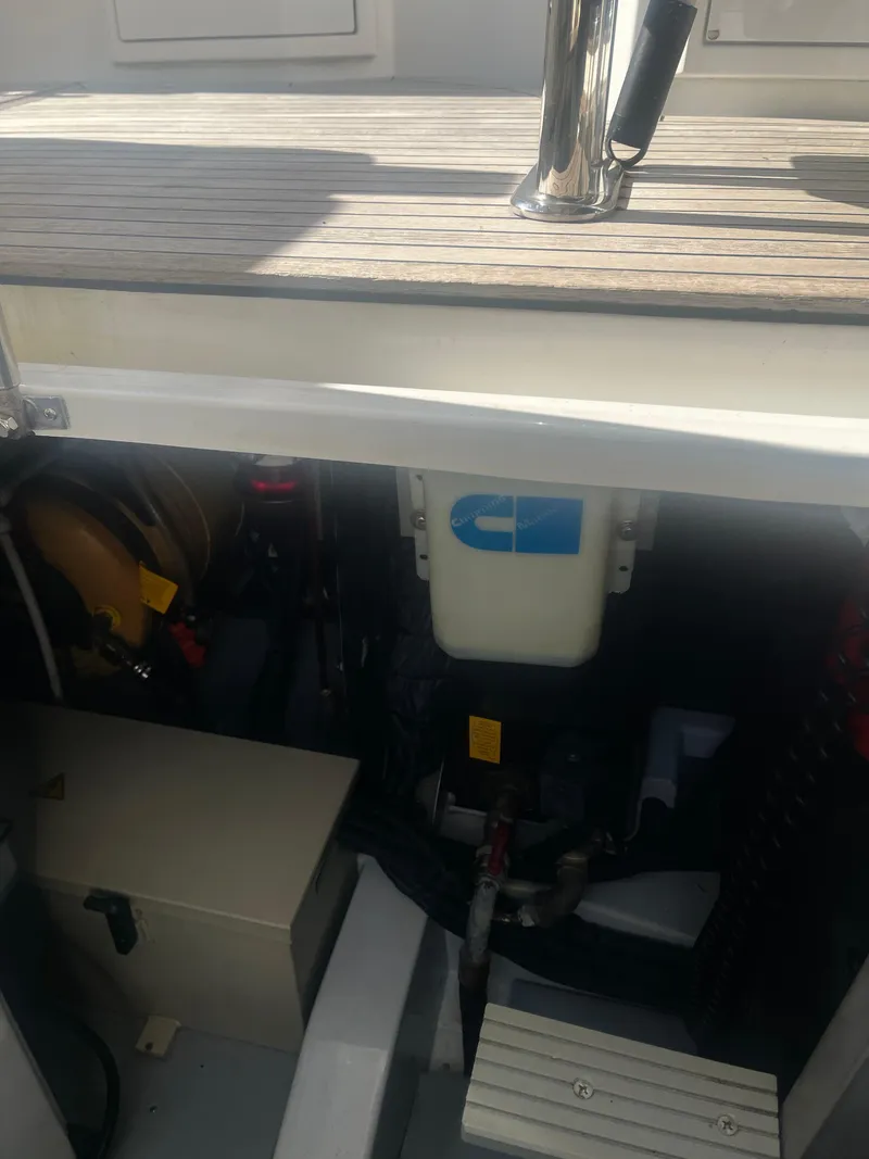 Slide: The Image of Engine compartment of 2013 Azimut 40 Flybridge yacht, showcasing mechanical components. - 13