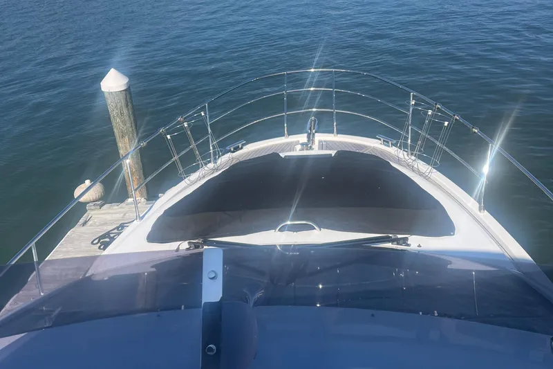 Slide: The Image of Azimut 40 Flybridge 2013 yacht docked, view from flybridge over water. - 24