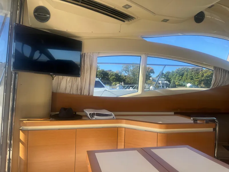 Slide: The Image of Interior of 2013 Azimut 40 Flybridge yacht with TV and scenic window view. - 33
