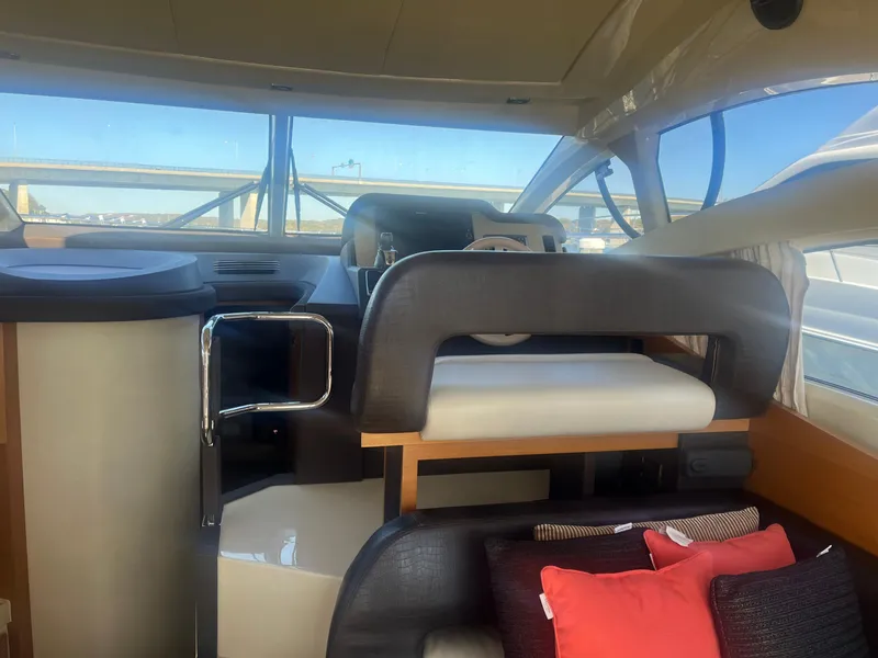 Slide: The Image of Interior view of 2013 Azimut 40 Flybridge yacht with modern seating and helm. - 35