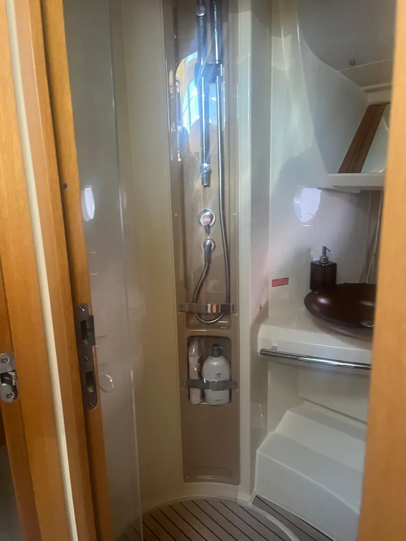 Slide: The Image of Bathroom interior of 2013 Azimut 40 Flybridge yacht, featuring shower and sink. - 38