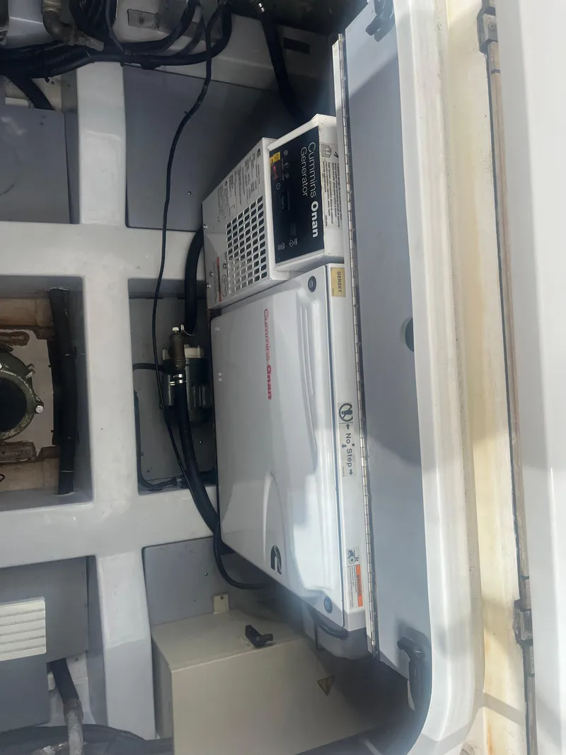 Slide: The Image of 2013 Azimut 40 Flybridge engine compartment with Cummins Onan generator. - 9