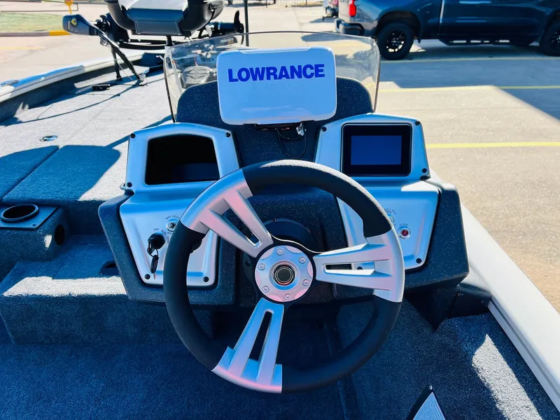 Slide: The Image of 2025 Tracker Pro Team 190 boat dashboard with Lowrance navigation system. - 23
