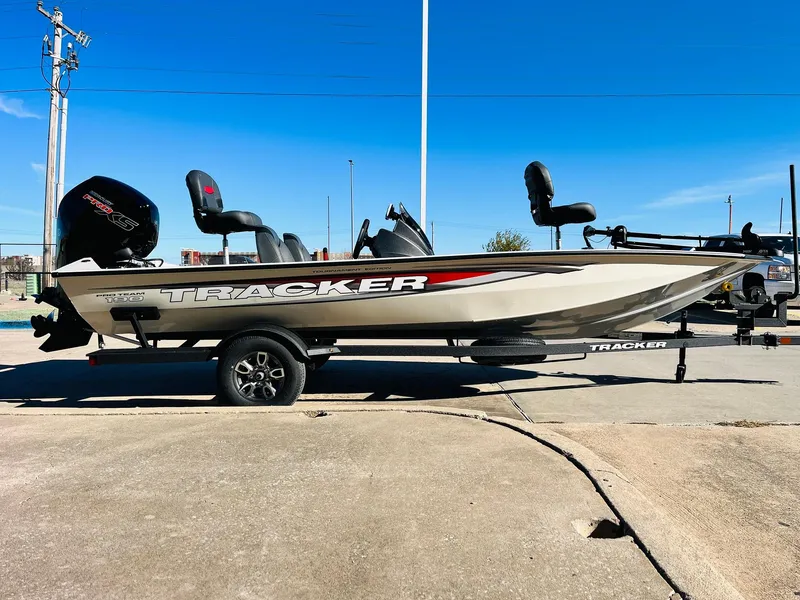 Slide: The Image of 2025 Tracker Pro Team 190 fishing boat on trailer, side view. - 4