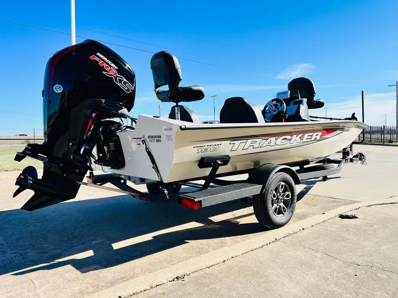 Slide: The Image of 2025 Tracker Pro Team 190 boat on trailer, outdoor setting, clear sky. - 5