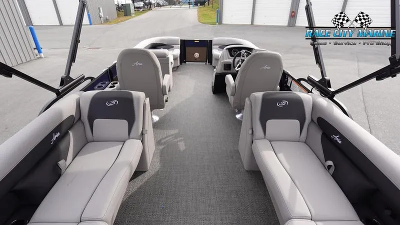 Slide: The Image of 2025 Barletta ARIA 22QC pontoon boat interior with plush seating and modern design. - 11