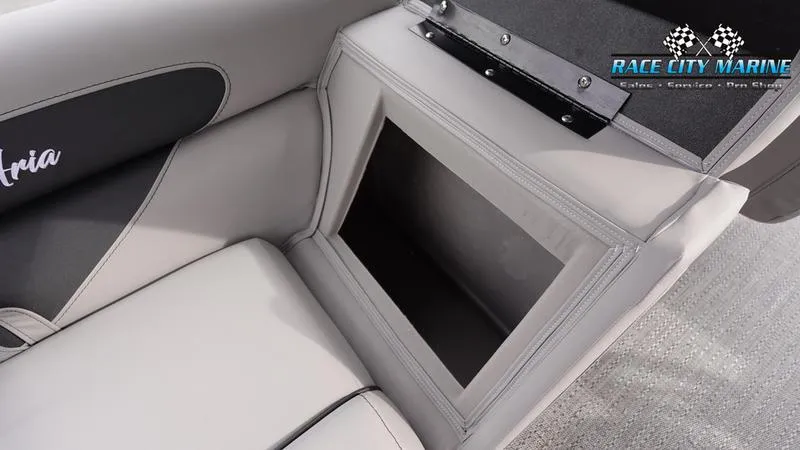 Slide: The Image of 2025 Barletta ARIA 22QC boat seat storage compartment, Race City Marine branding. - 17
