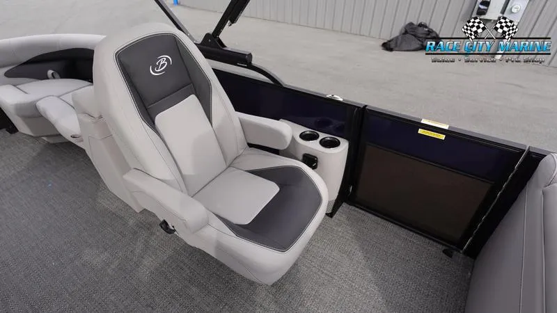 Slide: The Image of 2025 Barletta ARIA 22QC boat interior with plush seating and cup holders. - 18