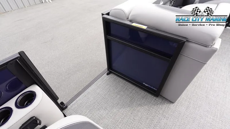 Slide: The Image of 2025 Barletta ARIA 22QC boat interior with seating and cup holders. - 21
