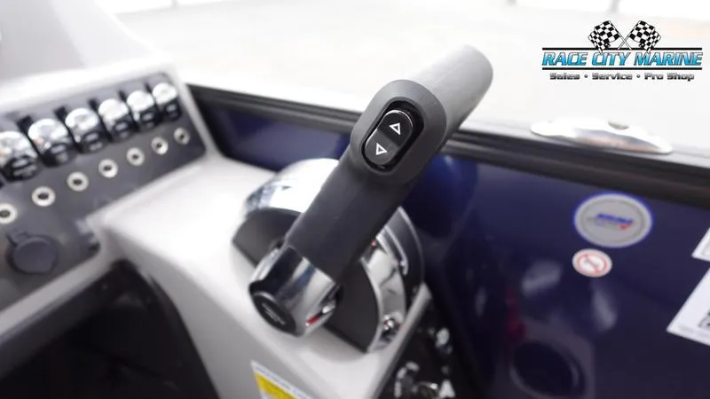 Slide: The Image of Close-up of 2025 Barletta ARIA 22QC boat throttle control at Race City Marine. - 24