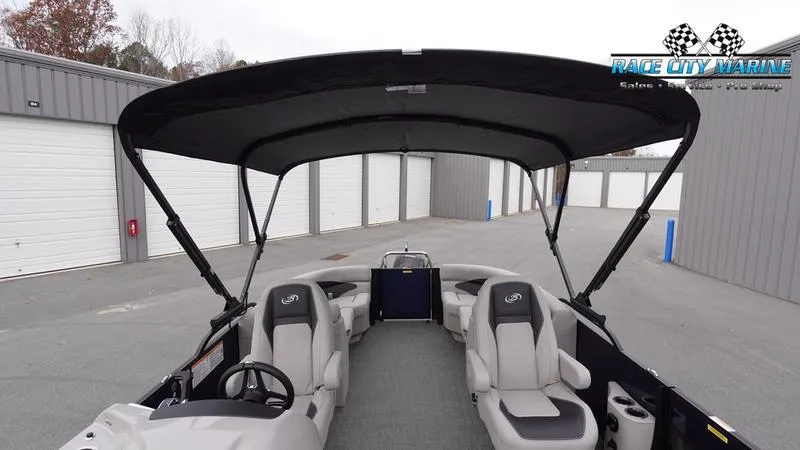 Slide: The Image of 2025 Barletta ARIA 22QC pontoon boat with canopy in storage facility. - 38