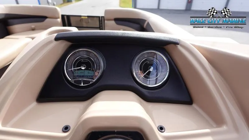 Slide: The Image of Dashboard of 2025 Barletta Cabrio 22QC boat with gauges, Race City Marine logo. - 36