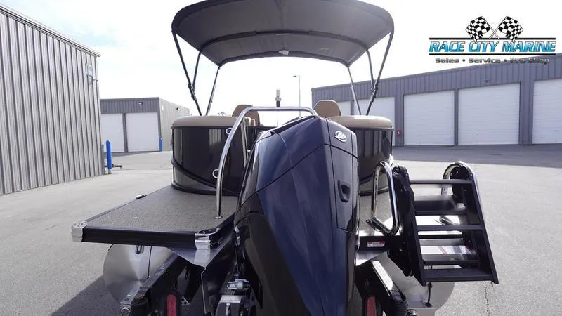 Slide: The Image of 2025 Barletta Cabrio 22QC pontoon boat with outboard motor at Race City Marine. - 4