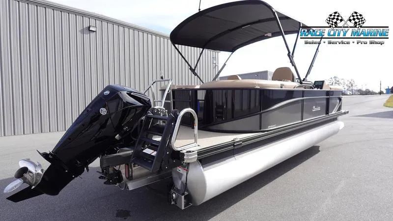 Slide: The Image of 2025 Barletta Cabrio 22QC pontoon boat with canopy and outboard motor. - 8