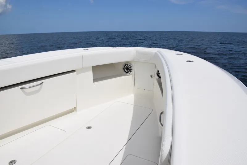 Slide: The Image of 2020 SeaVee 370z boat deck with ocean view, showcasing sleek design and spacious layout. - 15