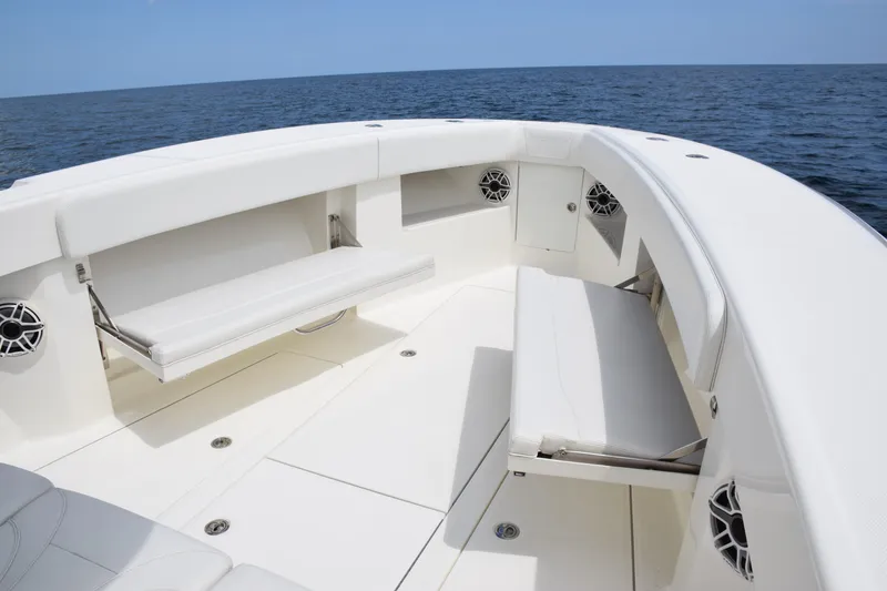 Slide: The Image of 2020 SeaVee 370z boat interior with white seating and ocean view. - 19
