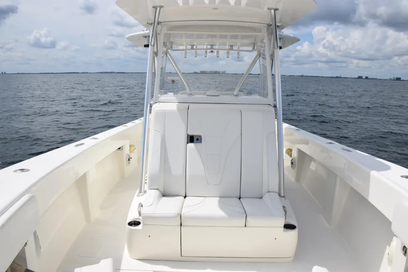 Slide: The Image of 2020 SeaVee 370z boat interior with white seating on open water. - 21