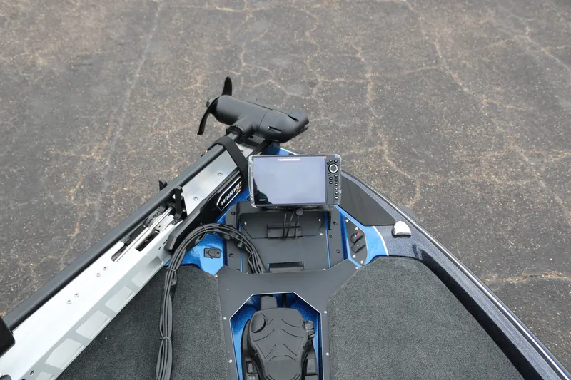 Slide: The Image of 2025 Skeeter ZXR 21 boat with advanced navigation system and trolling motor. - 13