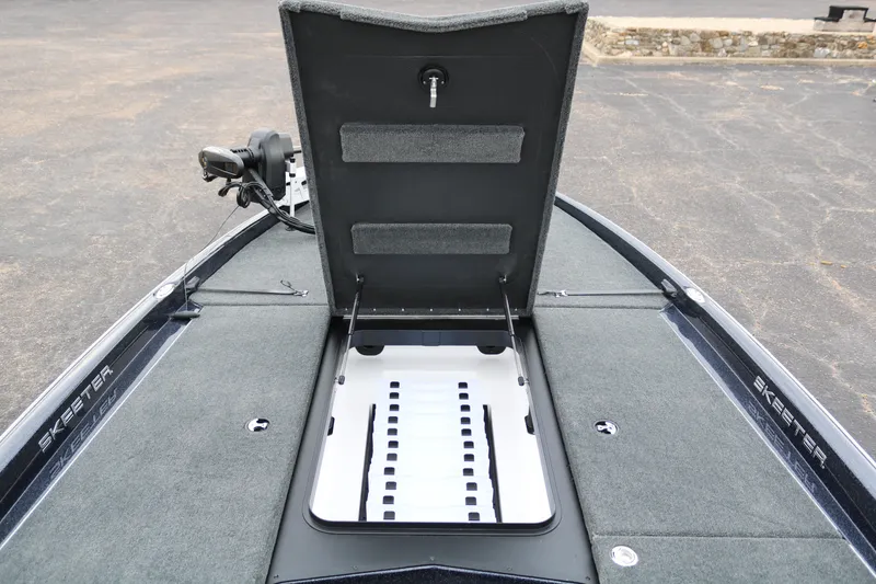 Slide: The Image of 2025 Skeeter ZXR 21 boat with open storage compartment on deck. - 17