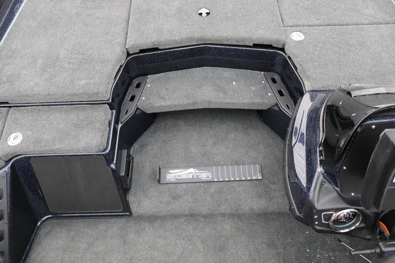 Slide: The Image of Skeeter ZXR 21 boat interior, 2025 model, featuring spacious deck layout. - 23