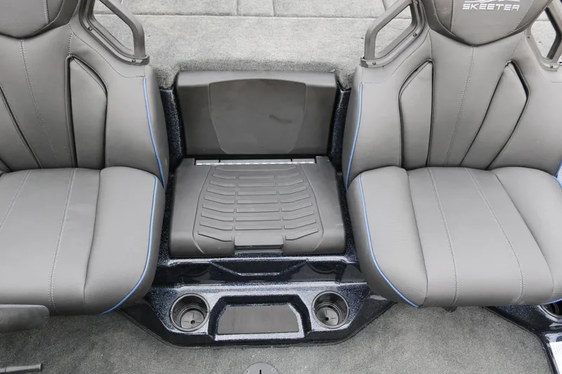 Slide: The Image of 2025 Skeeter ZXR 21 boat interior with gray seats and center console. - 27