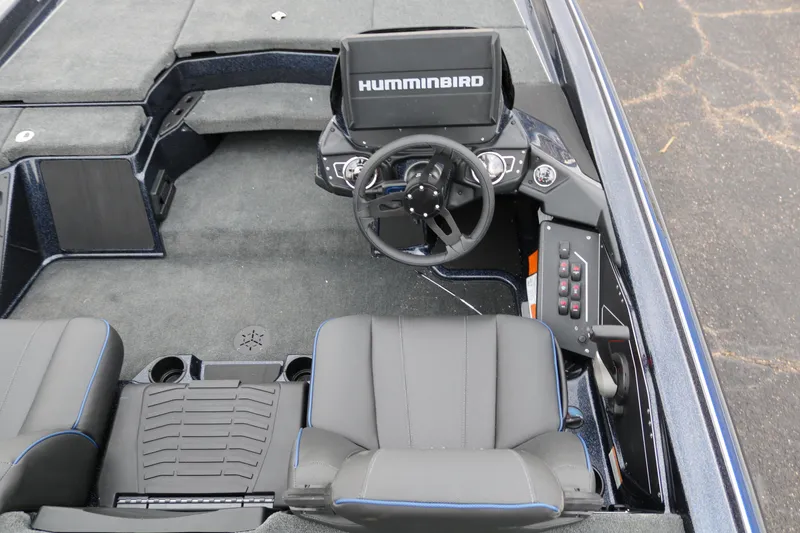Slide: The Image of 2025 Skeeter ZXR 21 boat interior with Humminbird electronics and modern seating. - 29