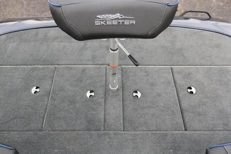 Slide: The Image of Skeeter ZXR 21 boat seat, 2025 model, with gray carpeted deck. - 33