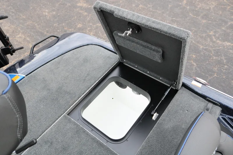 Slide: The Image of Open storage compartment on 2025 Skeeter ZXR 21 boat deck. - 36