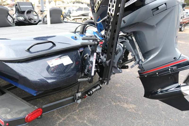 Slide: The Image of 2025 Skeeter ZXR 21 boat motor and stern detail on display. - 39