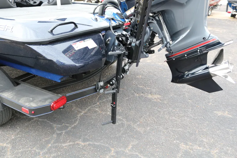 Slide: The Image of Skeeter ZXR 21 boat rear view, showcasing motor and trailer, 2025 model. - 40