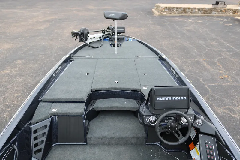 Slide: The Image of 2025 Skeeter ZXR 21 boat interior with Humminbird electronics and trolling motor. - 8