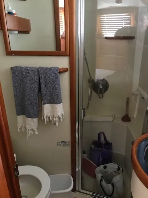 Slide: The Image of Bathroom of 2000 Pacific Seacraft 38T Fast Trawler with shower and toilet. - 19