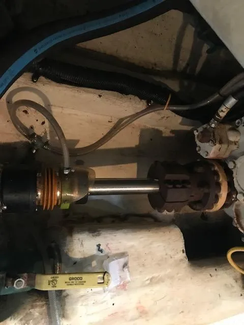 Slide: The Image of Engine compartment of 2000 Pacific Seacraft 38T Fast Trawler, showing mechanical components and hoses. - 30