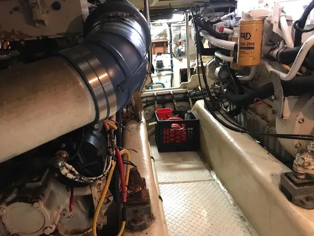 Slide: The Image of Engine room of 2000 Pacific Seacraft 38T Fast Trawler with visible machinery and equipment. - 32